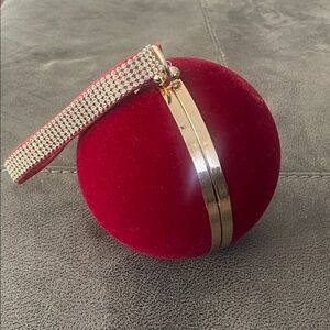 New York and Company Chic Red Velvet Ball Clutch with Gold Accents